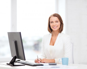 Medical office receptionist smiling