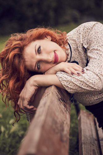 divorcee sitting on park bench