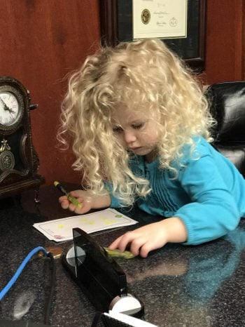 The newest staff accountant, and at age 3, the youngest