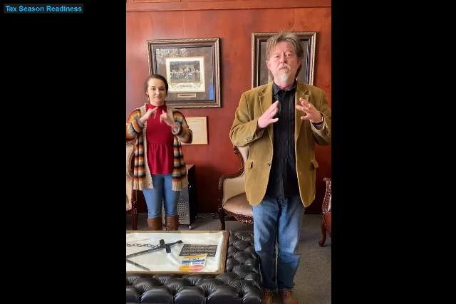 Greg talking and Shelby performing sign language